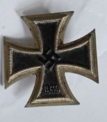 A WWII German Second World War Nazi iron cross 1st class medal  with brooch pin back.
