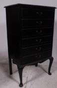 An Edwardian mahogany ebonised fall front music cabinet - Sheet music cabinet raised on cabriole