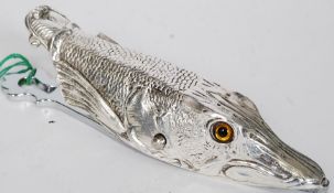 An interesting silver plated paper clip in the form of a fish.