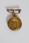 A open faced yellow metal untested gold fob watch incorporating a Swiss gold coin.