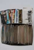 A shoe box (approx 600) of post 1950s postcards.
