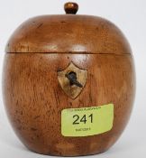 A wooden fruitwood tea caddy in the form of an apple having hinged top with key to centre