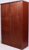 A retro 1960's Austinsuite teak wood compactum wardrobe armoire.