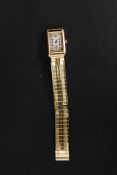 A swiss made early 20th century 18ct ladies gold watch by Juvenia. The case stamped 18k /750.