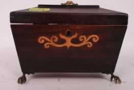 A Georgian sarcophagus marquetry inlaid shaped tea caddy, with brass finial to top,