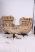 A pair of 1970's faux cream leather swivel armchairs of shabby chic form raised on quadruped bases