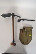 A British Army military issue spade complete in the canvas case together with a Lee Enfield Pig