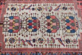 A 19th century Hamadan ( Savah Area ) handmade rug having vivid colours with unusual design on