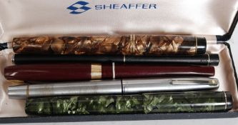 A collection of fountain pens to include 3 Shaeffer including 1 boxed,