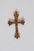 A 9ct gold Victorian crucifix stamped and hallmarked 375 to verso having chase decorated front.