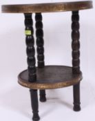A 20th century Chinese oriental carved wood and brass banded  two tier side table / lamp table of