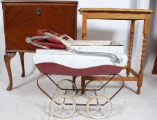 A 1950's mahogany queen anne revival record cabinet together with an oak barleytwist side table and