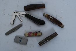 A collection of pen knives dating to the 20th century to include mother of pearl handle etc