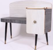 An excellent 1950's  retro vinyl black and white vinyl telephone table,