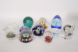 A collection of 12x assorted glass paperweights - to include Selkirk, Etched glass,