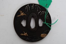 An antique style bronze and metal Japanese sword Tsuba - with signature