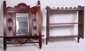 A vintage style kitchen ceiling hanging organiser with baskets and hooks.