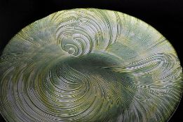A 20th century decorative studio art glass iridescent fruit bowl having green and white tones.