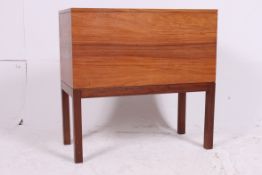 An excellent quality teak cabinet on stand.