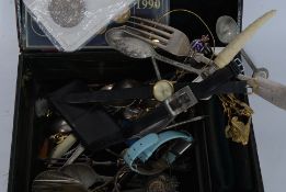 A vintage small leather case having a silver metal plaque to the top with notation.