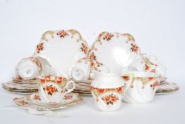 A 19th century Star China- Paragon part tea service in a chintz pattern to comprise, cups, saucers,