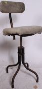A mid 20th century Industrial TanSad machinist swivel chair stool.