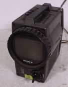 A retro Sony TV - Solid State TVS1UK having unusual shape .