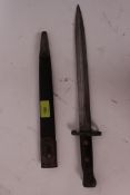 An Edwardian 1907 pattern WWI First World War bayonet, within original sheath. It has a 8 cm width.