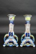 A pair of Rouen Faience pattern candlesticks in the early 18th century style,
