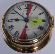 A vintage brass Smiths ships clock. It has a 10cm height and 17cm width.