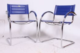 Two ( a pair ) of contemporary Italian blue leather cantilever chairs having chrome frames with