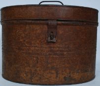 A Victorian metal hat box having hinged top and shaped body