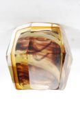 A 1930's Art Deco smoked glass inkwell of hexagonal form with recess to the top