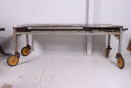 A mid 20th century Industrial military marked X-Ray table trolley.