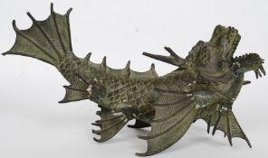 A believed early 20th century bronze Japanese oriental censer in the form of Shachihoko,