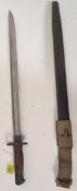 A British military 1907 pattern issue bayonet complete with leather and canvas scabbard.