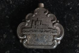 A white metal (stamped ' 800 ' indicating continental silver ) scent bottle.