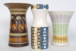 A collection of three retro vases to include two Denby 20th century vases and a Hornsea retro vase.