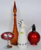 A fantastic retro group to include A Japanese Rythm clock, soda syphons and a retro decanter.