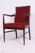 A good 1960's Danish carver armchair having tapered legs with upholstered seat and back rest with
