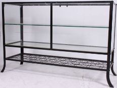 A vintage style shop display cabinet / haberdashery unit  having glass shelves and glazed doors