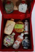 A good collection of 8x Chinese oriental snuff bottles - comprising of all different examples -