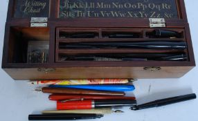 A collection of artists set within the ' Travellers Writing Chest ' complete pens and nibs along