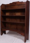 A good quality solid oak open window bookcase cabinet shelves being fully beaded having raised