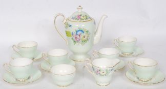 A 1930's Art Deco Royal Crown Pottery ' Perunia ' pattern part tea service to include teapot, cups,