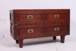 An Anglo - Indian Peshwari brass line inlaid cabinet having low rectangular body with drawers all