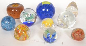 A collection of 10x studio glass 20th century paperweights.