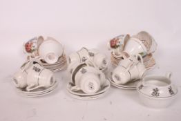 A vintage Royal Cauldon part tea service together with a Crinoline lady decorated part tea service