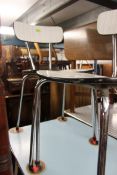 A retro 1950's tubular metal painted and formica kitchenette dining table together with 2 matching