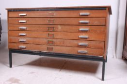 A 1960's large teak wood architects / Industrial plan chest of drawers.